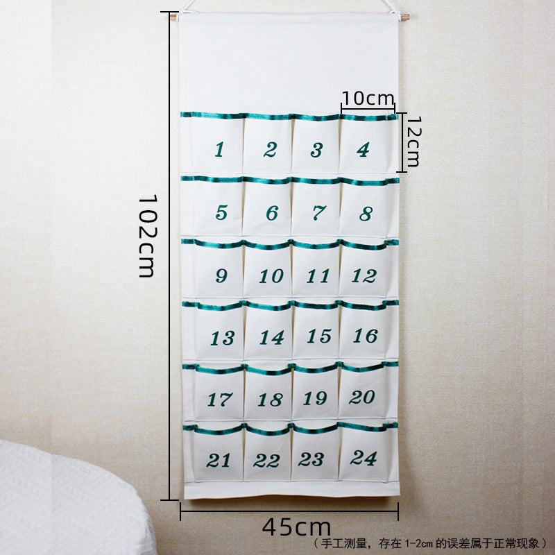 Custom Christmas Advent Calendar for kids, hand-embroidered DIY with name, 24-pocket countdown calendar.